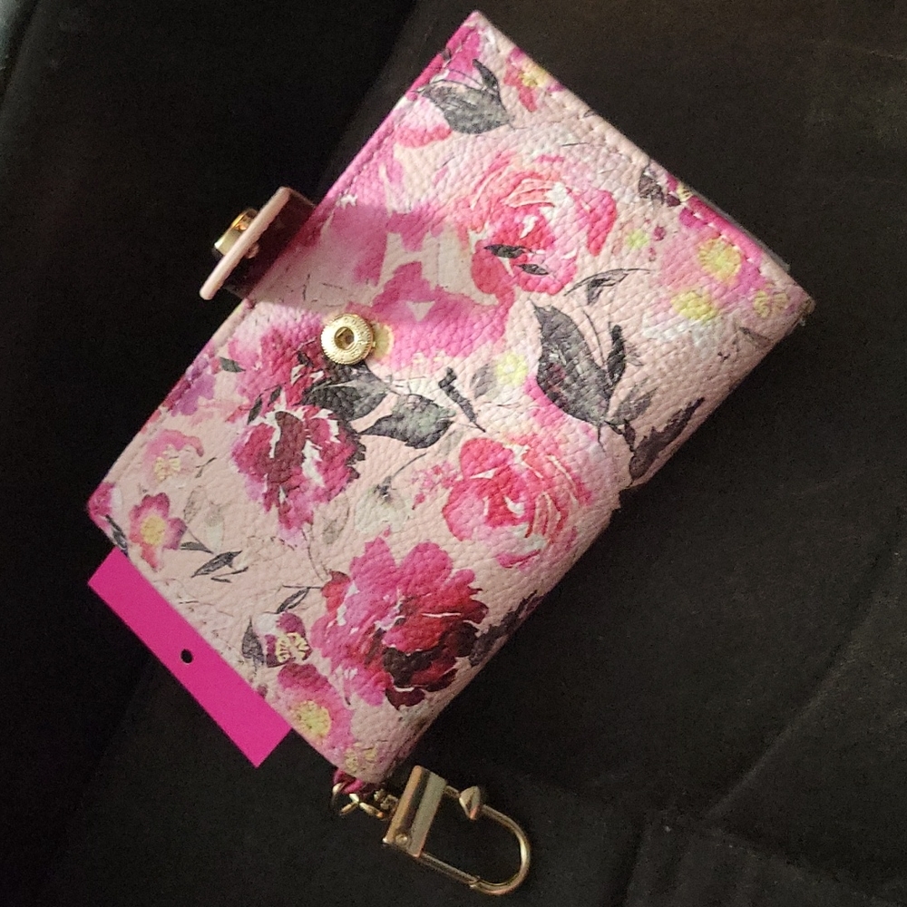 Beautiful, new Betty Johnson pink wallet with flowers.